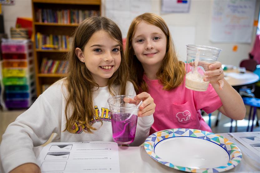 College Grove students in a science class